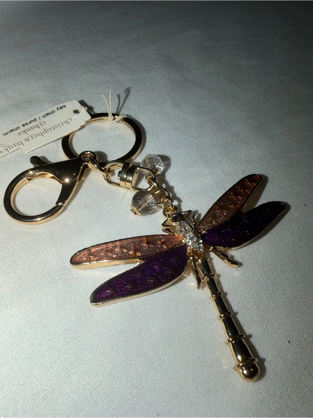 Christopher & Banks Gold Dragonfly Keychain with Purple and Gold Tone Wings